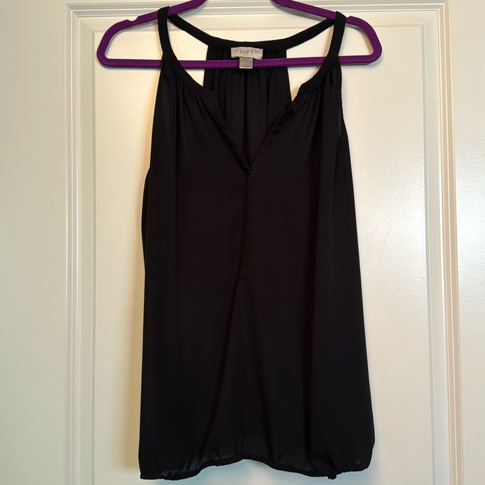Sleeveless nylon top with elastic bottom, size L